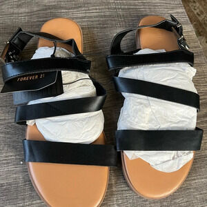 Forever 21 strapy sandals brand new in packaging. Size 10. Black faux leather